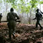 Maoist: ପୁଲିସ ଘେରାବନ୍ଦୀରେ ମାଓନେତା: ‘ଗୁଳି ନ ଚଳାଇ ଆତ୍ମସମର୍ପଣ ସୁଯୋଗ ଦିଅନ୍ତୁ’, ମିସିର ବେସରାଙ୍କ ପୁଅଙ୍କ ନିବେଦନ